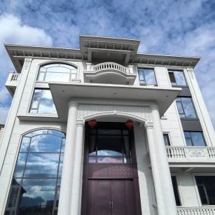 丽水白麻别墅外墙干挂石材效果示例